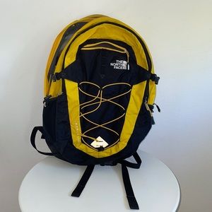 Black and yellow North Face backpack